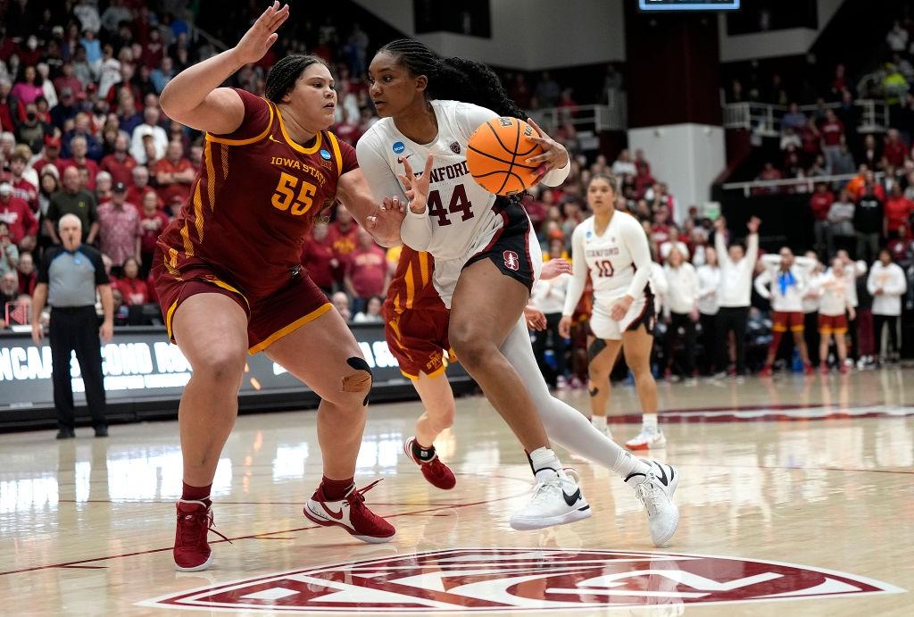 Kiki Iriafen drives against ISU's Audi Crooks