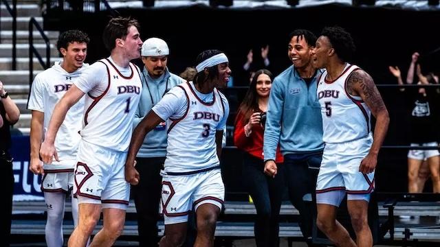 DBU celebrates the game-winning shot in the LSC men's basketball championship. 